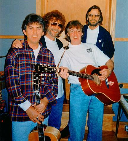 Paul is the only person in the studio brave enough not to cover up the white Wings t-shirt he has insisted they all wear...