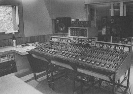 Ringo's hand can be spotted under the ancient mixing desk as he handcranks the pump...